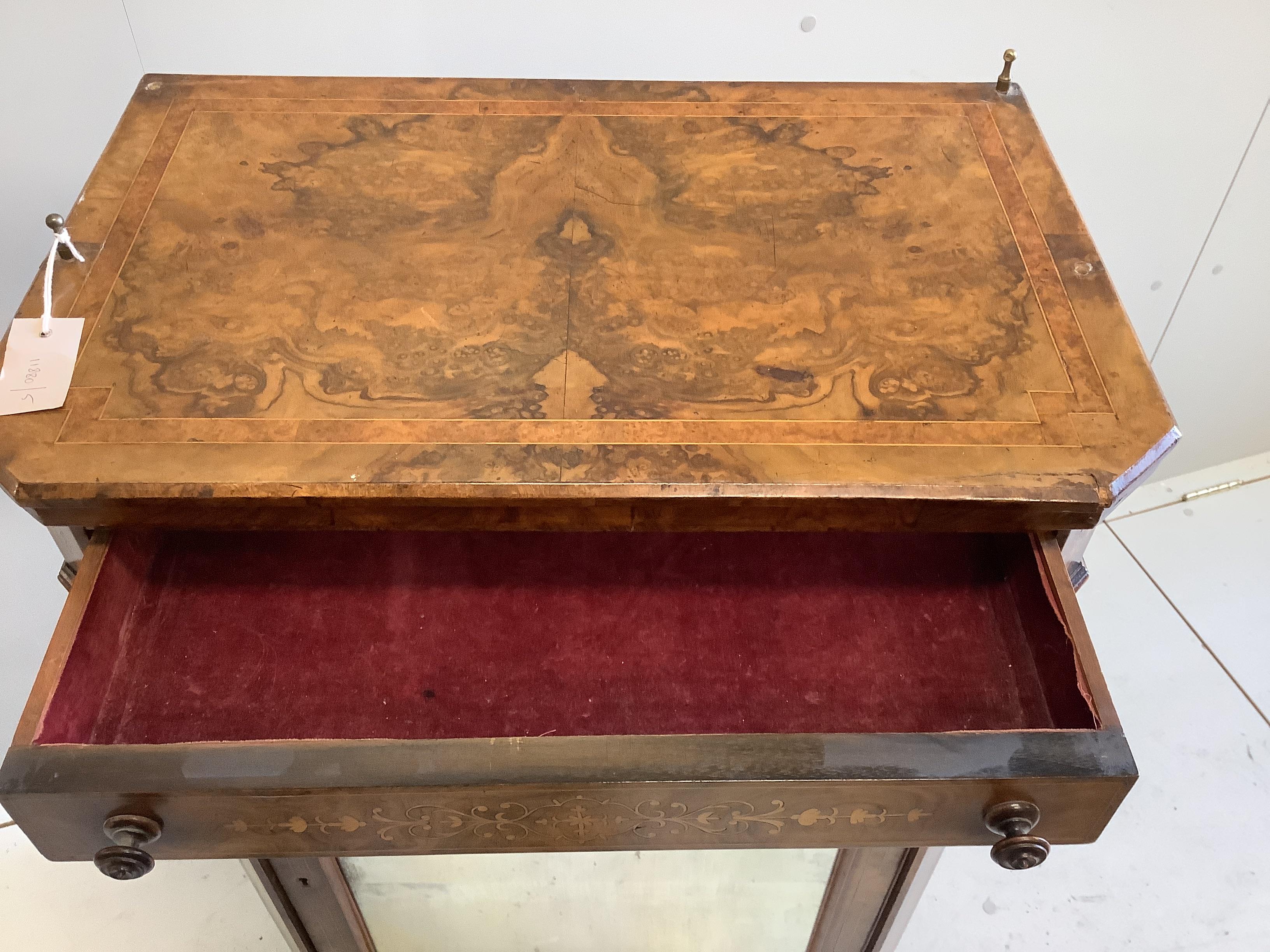 A late Victorian marquetry inlaid amboyna banded figured walnut music cabinet, width 61cm, depth 38cm, height 99cm